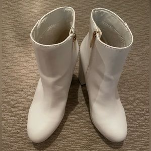 white leather ankle boot